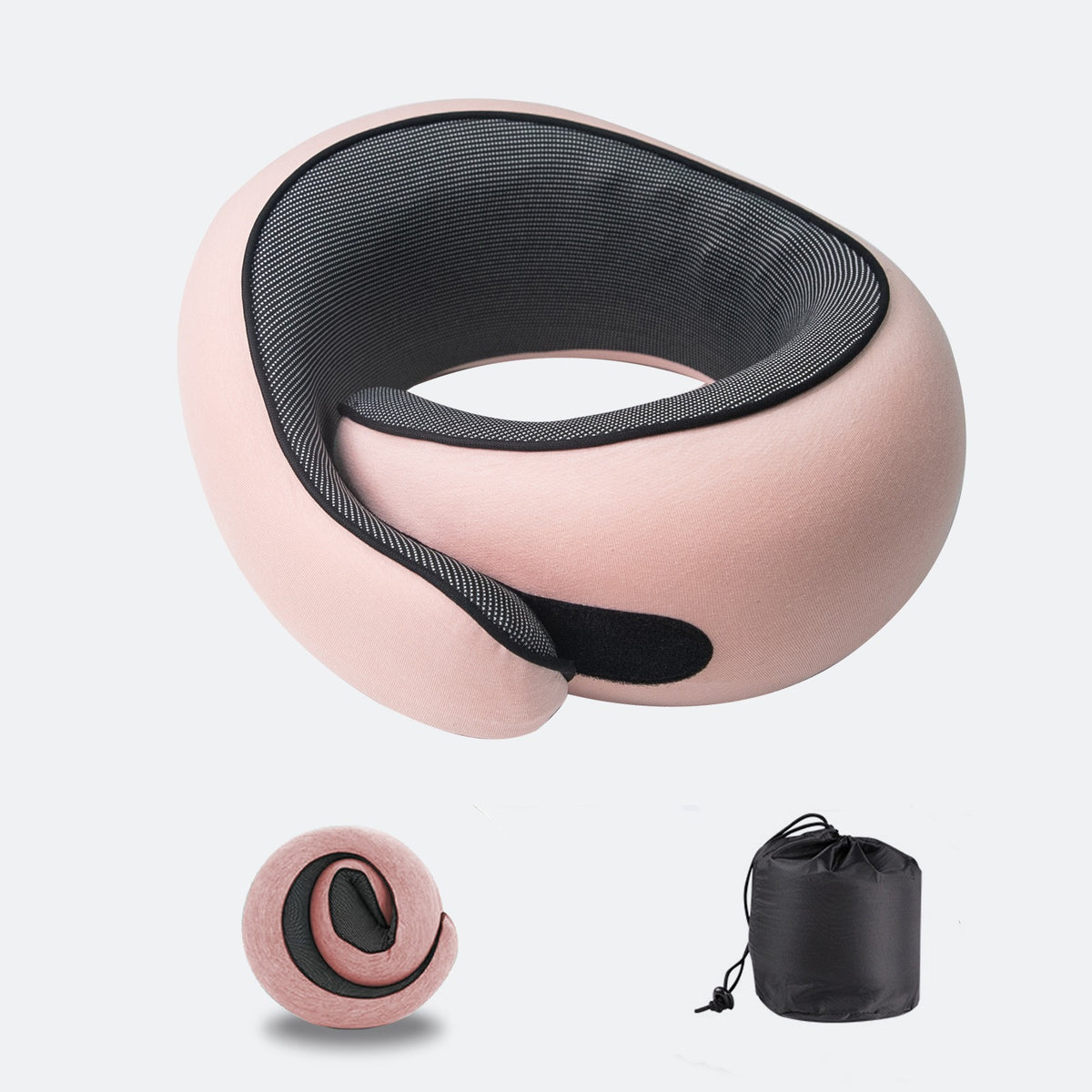 Resekudde i rosa, ihoprullad och i påse